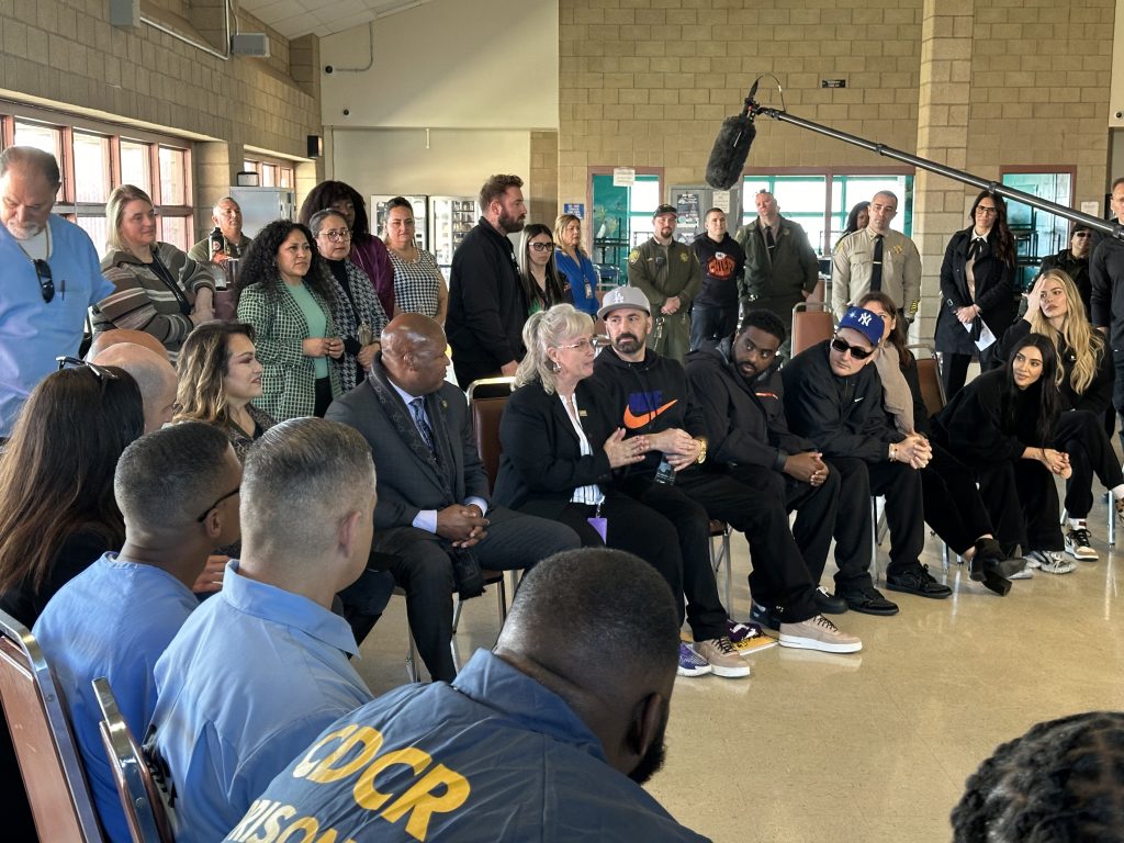 The Kardashian sisters visit Valley State Prison with their film crew.