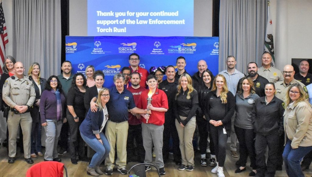 A group of law enforcement officials at a kickoff 2024 event for Special Olympics of Northern California.