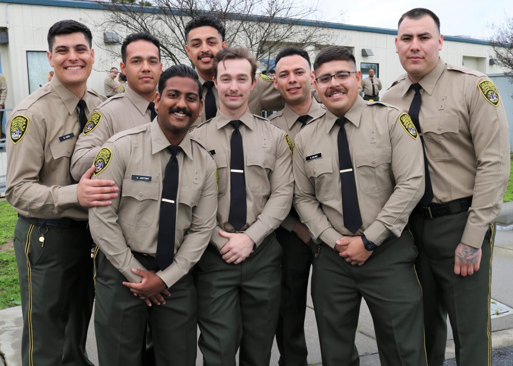 CDCR correctional officer cadets pose for a group photo.