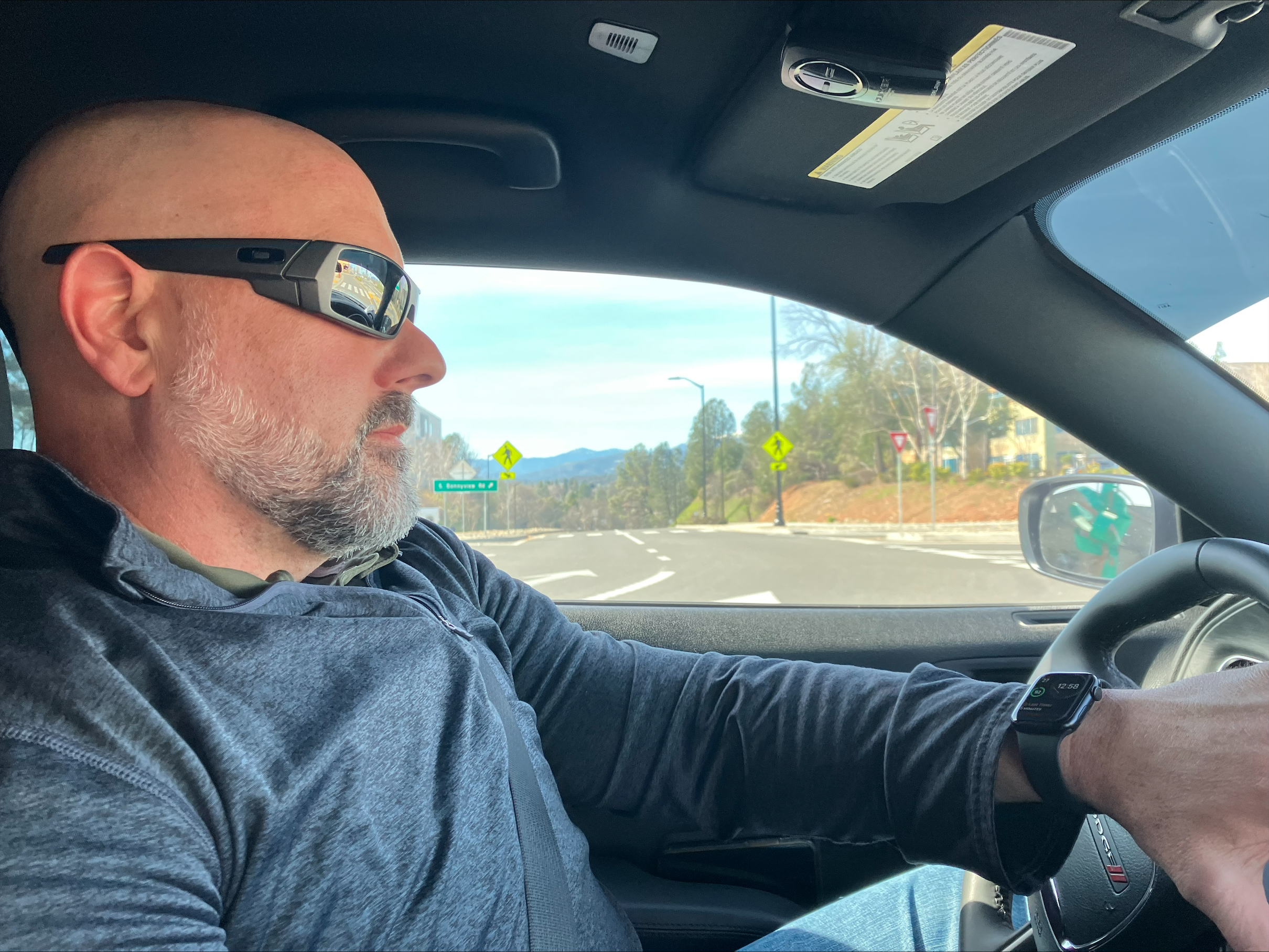 A parole agent with the Redding Parole Unit drives through town.