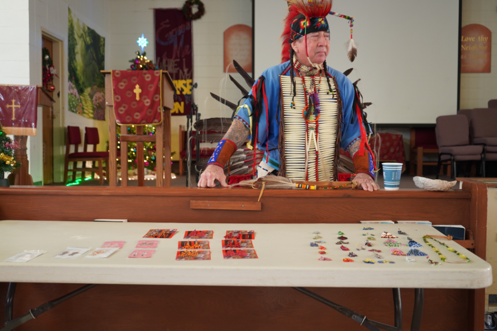 Native American incarcerated standing at table