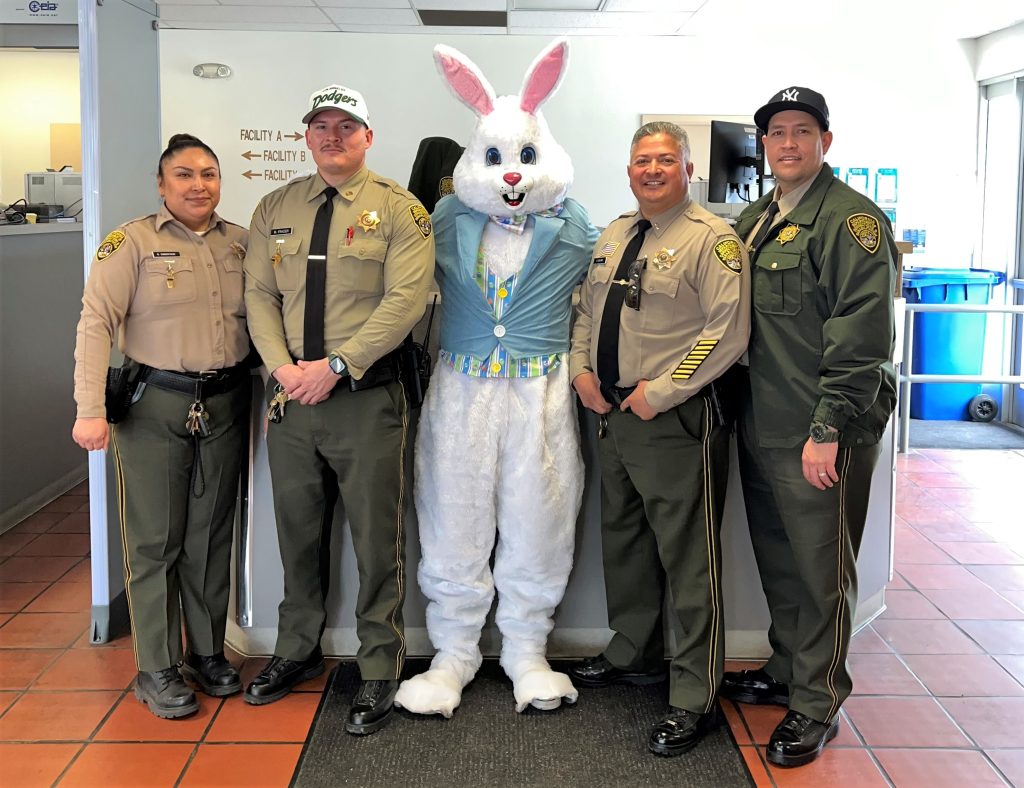 Four CDCR staff members and someone wearing an Easter bunny costume for March visiting events. 