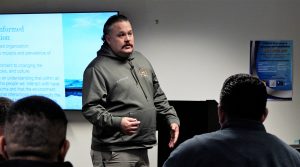 A trainer teaches a class on one of the pillars of the California Model.