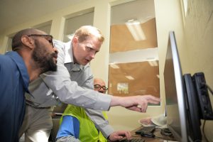 Two library patrons and a librarian at Folsom State Prison.