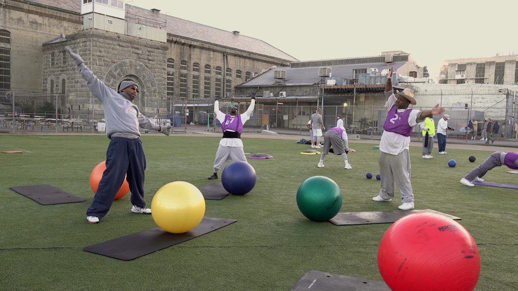 Exercises on a prison yard.