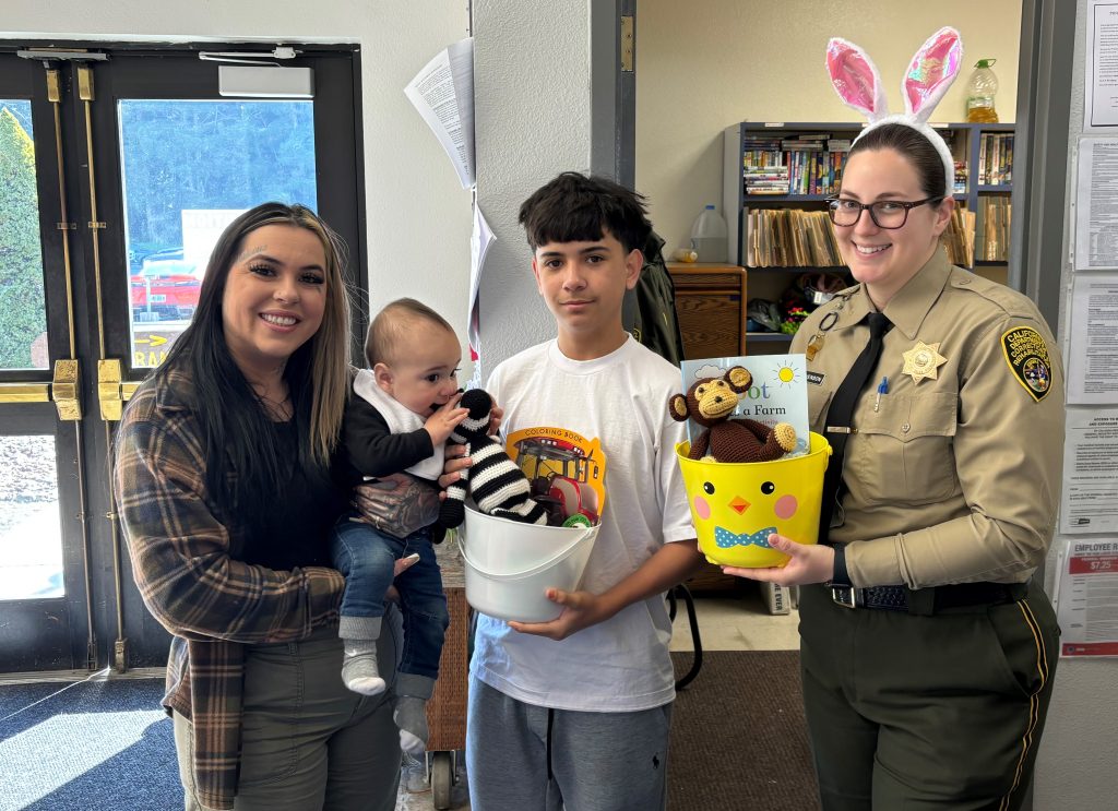 Easter visiting at Pelican Bay State Prison with a staff member and three visiting family members.