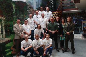 Pelican Bay State Prison (PBSP) mural artists with prison staff.