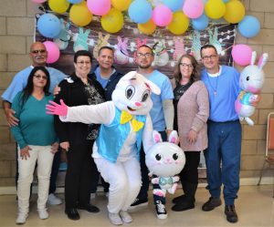 Family and incarcerated people with the Easter Bunny for visiting event at CDCR Valley State Prison in March.