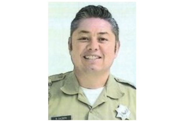 Reymundo Caldera wearing his correctional officer uniform. Image used for obituary notification.