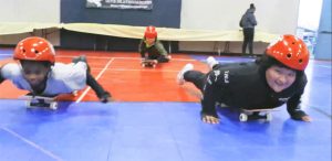 Children on new skateboards.