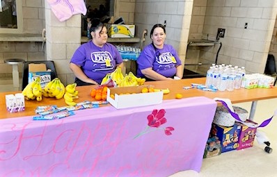 A table with snacks for visiting families at a prison.
