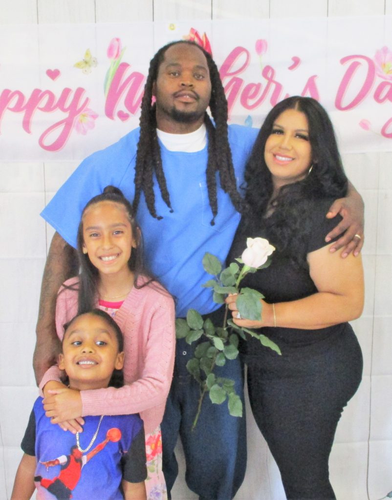 Family visiting with children at California Rehabilitation Center in Norco.