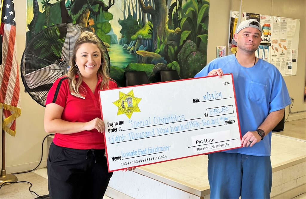 Oversized check presentation to Kern County Special Olympics.