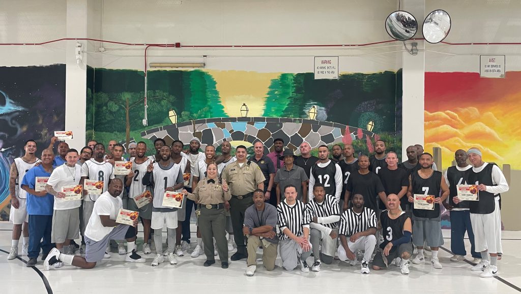 Basketball players, coaches, Ironwood prison staff, and referees.