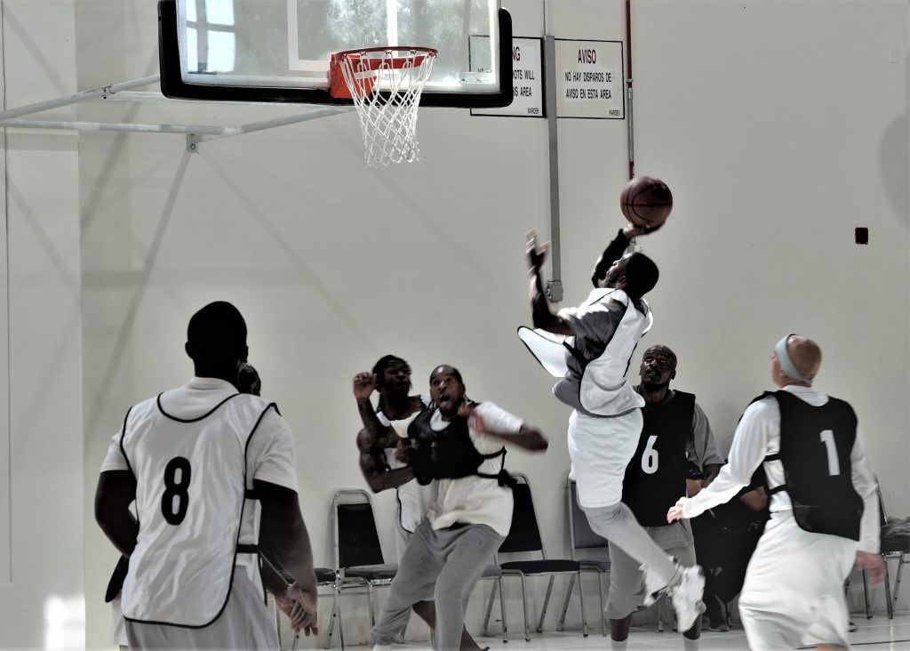 Incarcerated people play the first intra-facility basketball game at Ironwood State Prison.