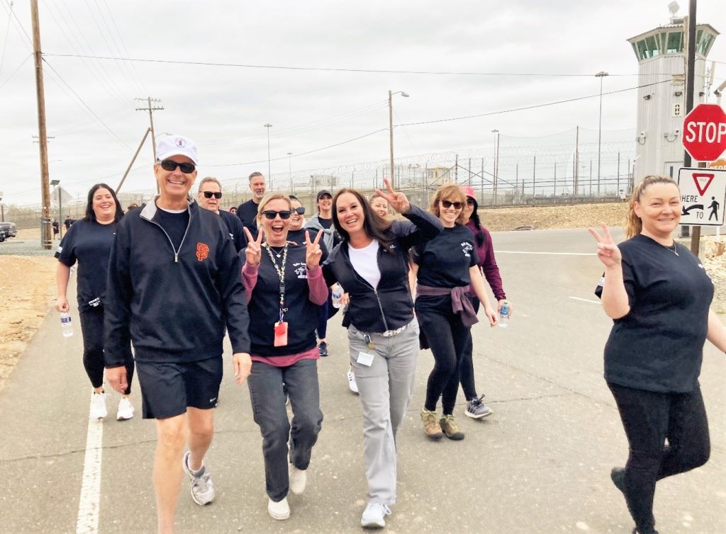 A group of walkers outside Mule Creek State Prison.