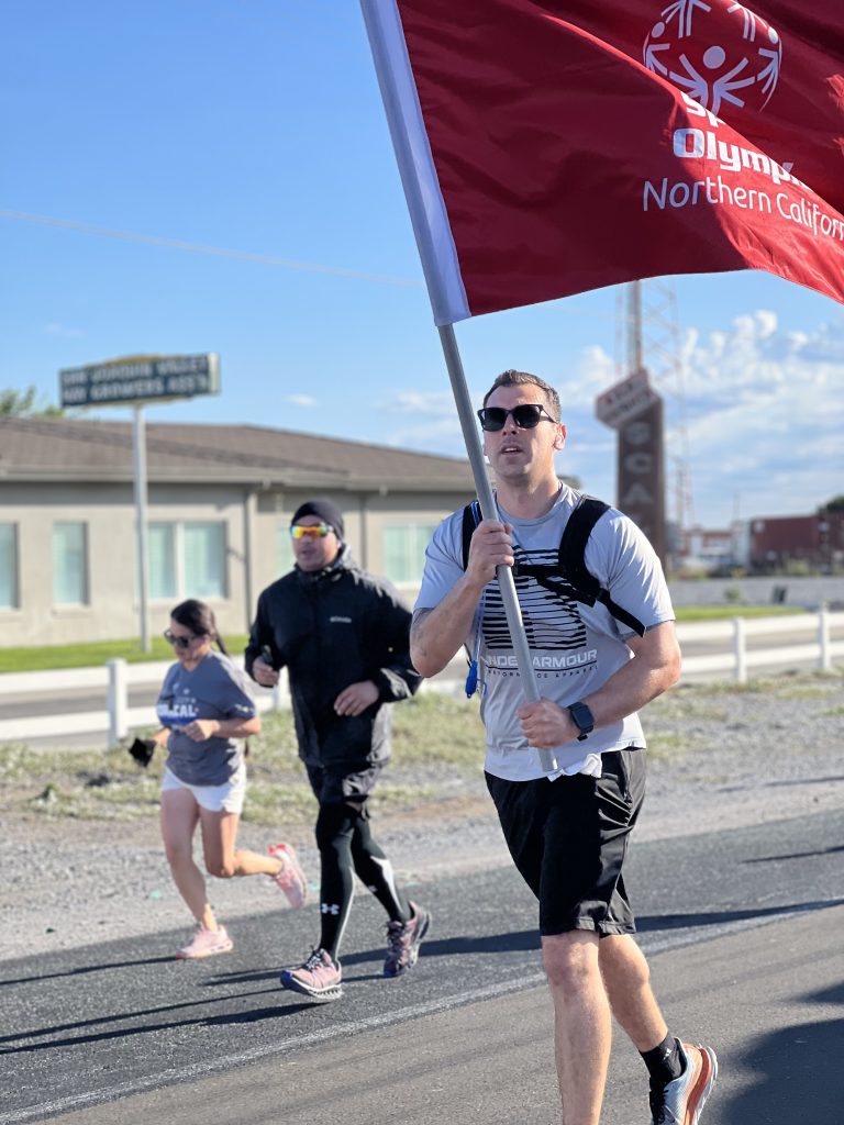 California Health Care Facility staff running during the torch run.