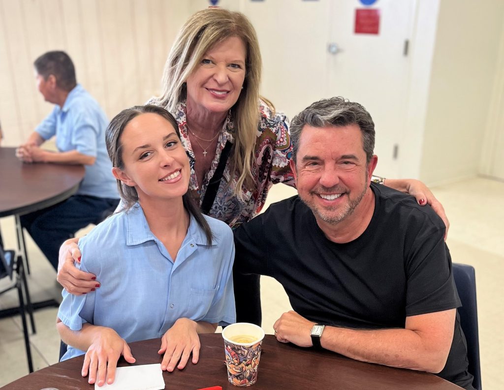 parents visiting an incarcerated young woman.