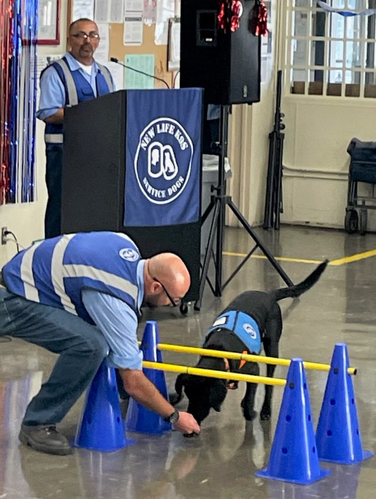 Demonstration of dog skills at California Men's Colony.