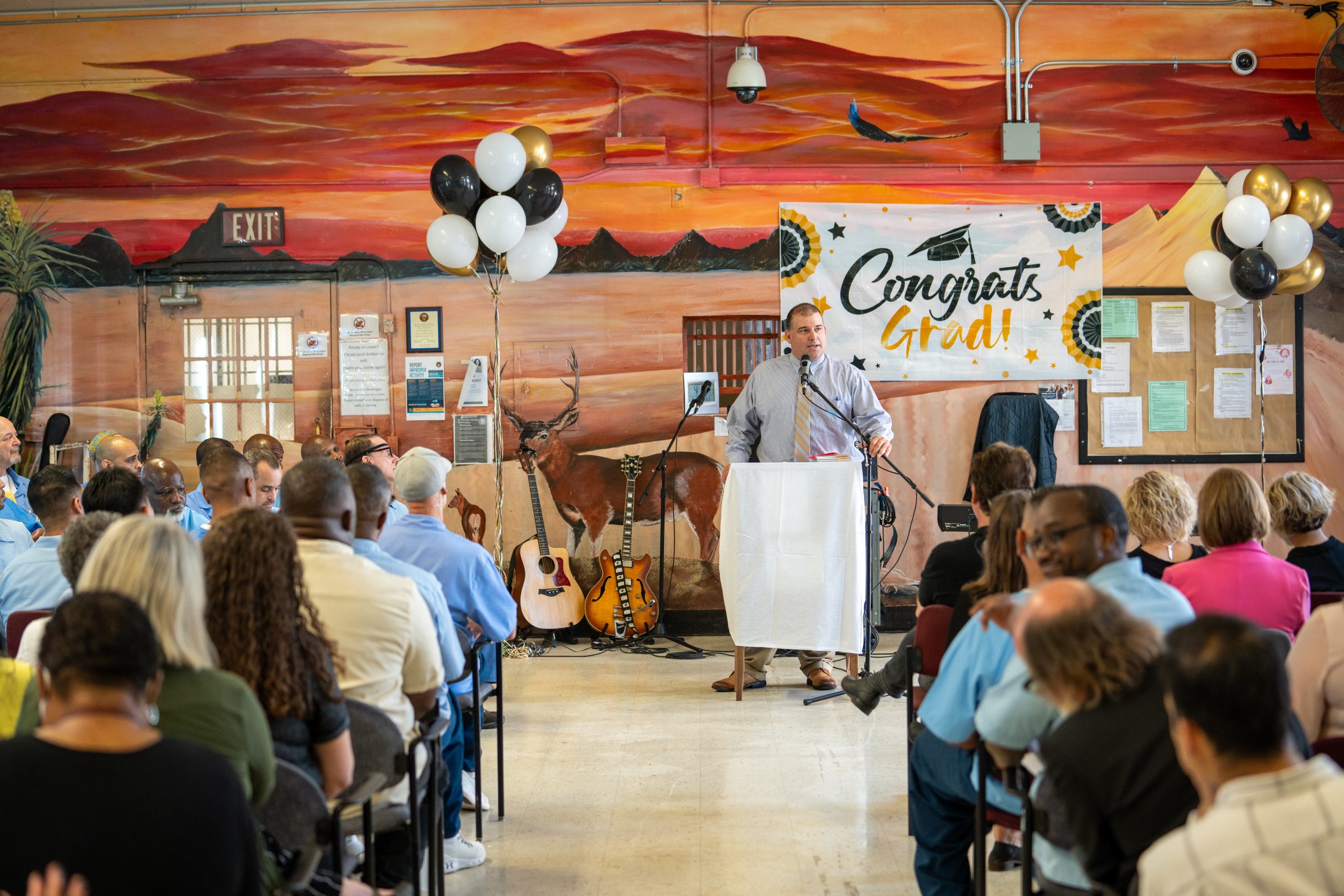 CMF Warden Cueva speaks at the first palliative care training graduation.