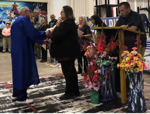 incarcerated at CTF shaking hands with staff