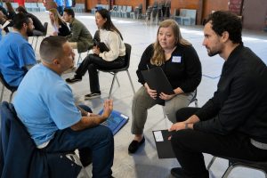 CRC coaching incarcerated people for Defy Ventures.