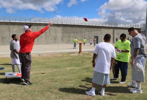 Peace Day at Kern Valley State Prison with staff and the incarcerated population playing a game together.