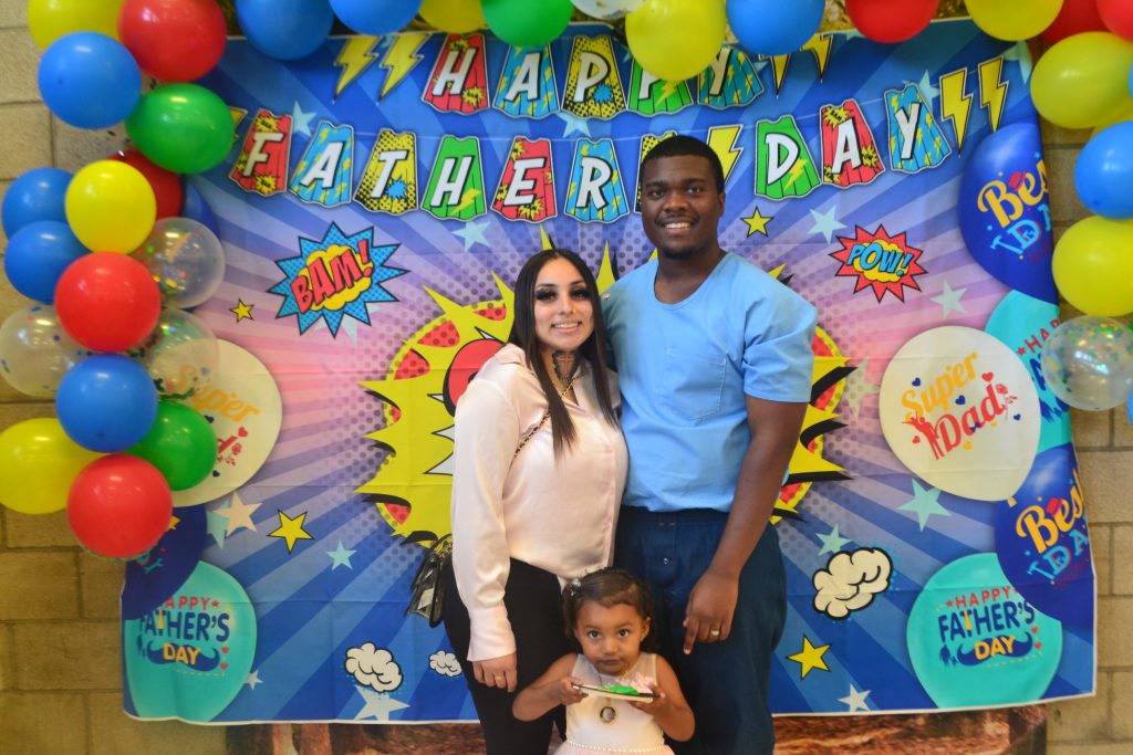 A family for Father's Day visiting at Valley State Prison. 