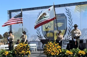 CIW Honor Guard assists a college graduation by presenting the colors to begin the ceremony.