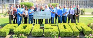 FOL staff donate check