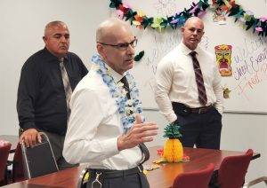 Leadership team at Kern Valley State Prison speak at a gathering of the institution's executives.