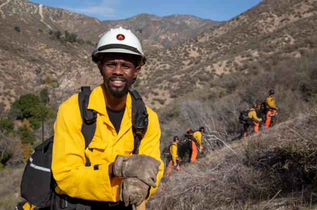 incarcerated firefighter posing