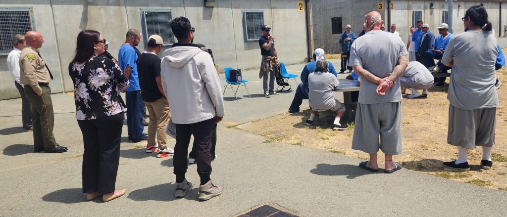 Zack Skow speaks to incarcerated people at San Quentin Rehabilitation Center.