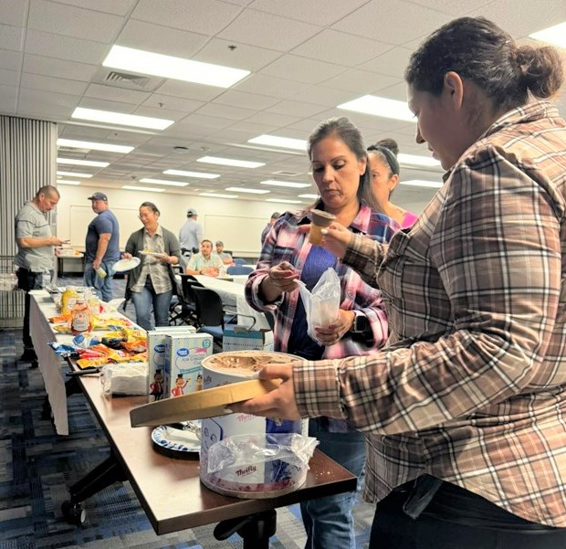 El Monte District staff making plates of food