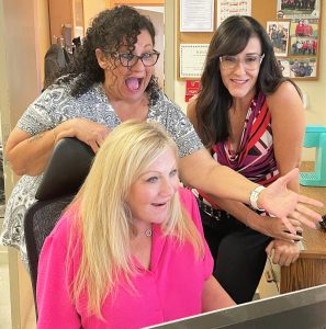 Three teachers express amazement at the speed of a new SIS-SOMS system.