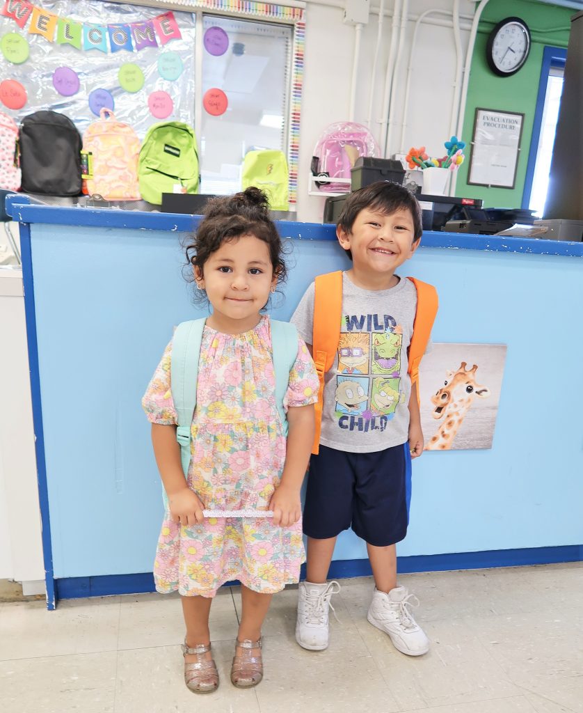 Children with backpacks.