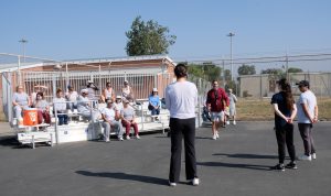 Incarcerated people participate in a tennis clinic at California Institution for Women.