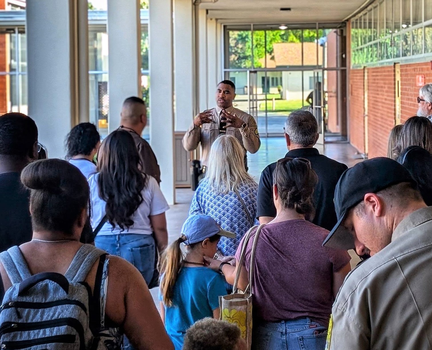 Families of cadets tour the academy as part of the family wellness initiative.