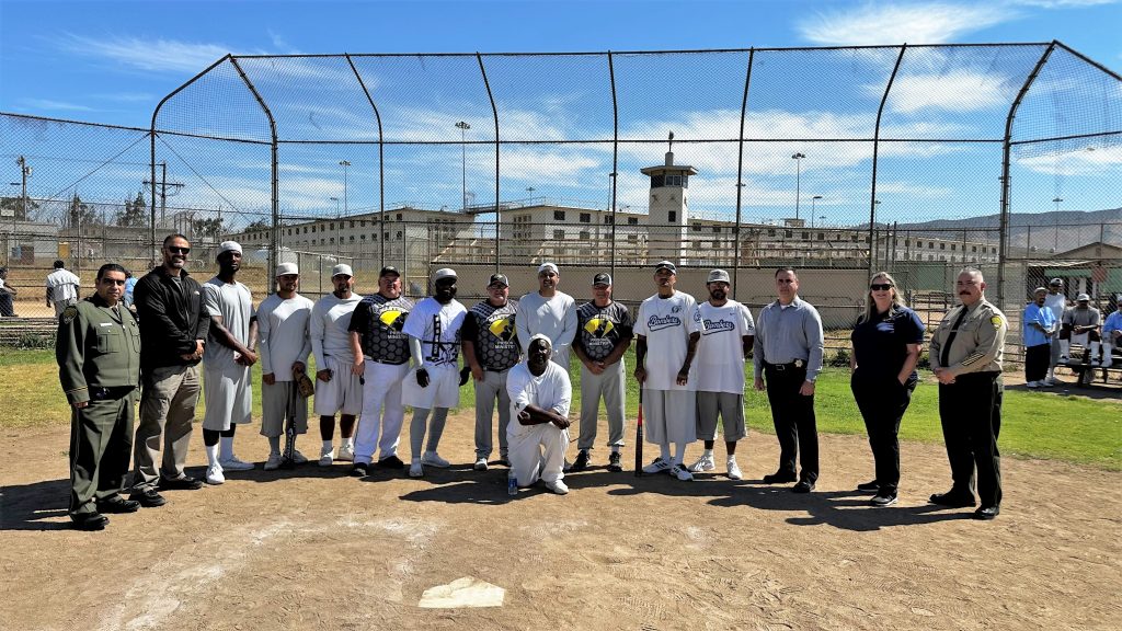 Group photo of people at the Correctional Training Facility at Soledad.