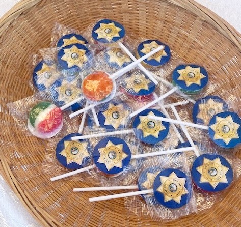Parole booth with lollipops. 