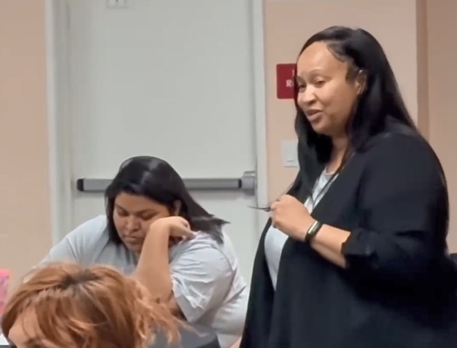 A parole agent teaches a Wolf Connection class to reentry participants.