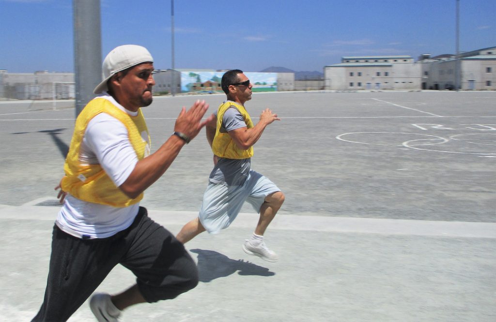 RJ Donovan Correctional Facility E Yard Olympics with two people racing.