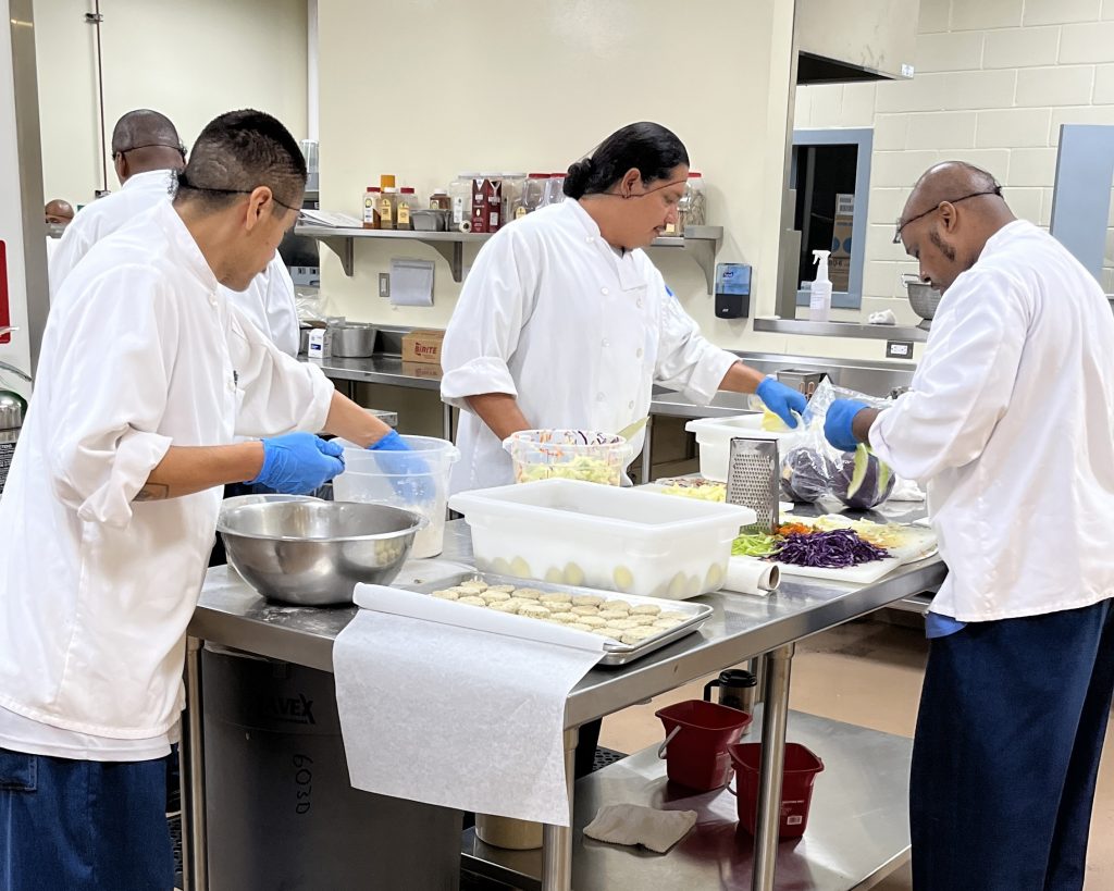 People work in the kitchen.