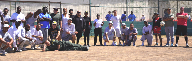 Group photo with staff members and incarcerated people at San Quentin Rehabilitation Center.