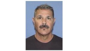 Mark Loomis, a retired correctional officer, obituary featured image.