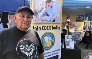 A spiritual leader at the CDCR booth.