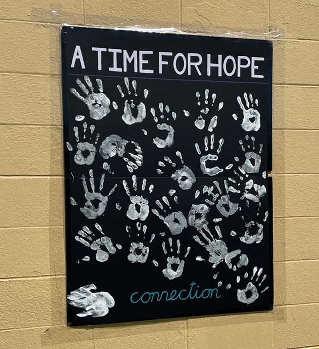 A Time for Hope with handprints.
