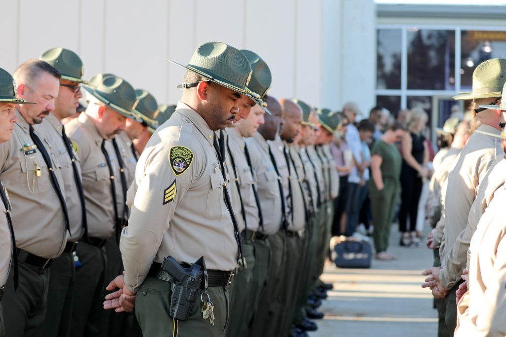 CDCR staff and cadets observe a moment of silence at the academy in Galt.