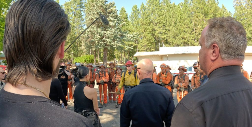 Group photo of Kim Kardashian and conservation camp officials and program participants.