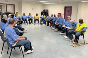 Taylor Swift fans who are serving life sentences at High Desert State Prison in Susanville, California, have formed a self-help group and are shown sitting in a semi-circle inside the prison.